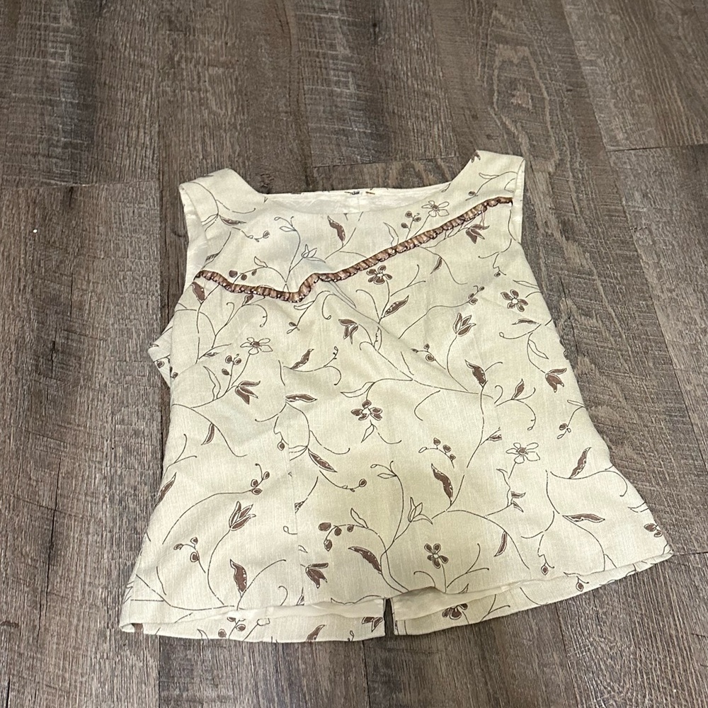 Cream Ruffled Tank Top with Sleeveless Design